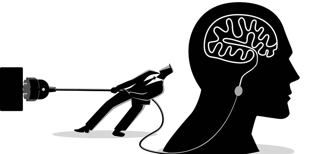 silhouette of a head with a cord plugged into a wall and a man trying to unplug it
