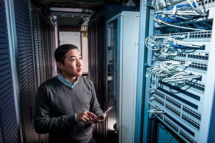 IT worker checking network connections