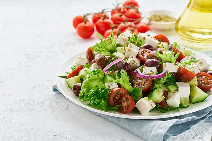 Large plate of salad and tomatoes