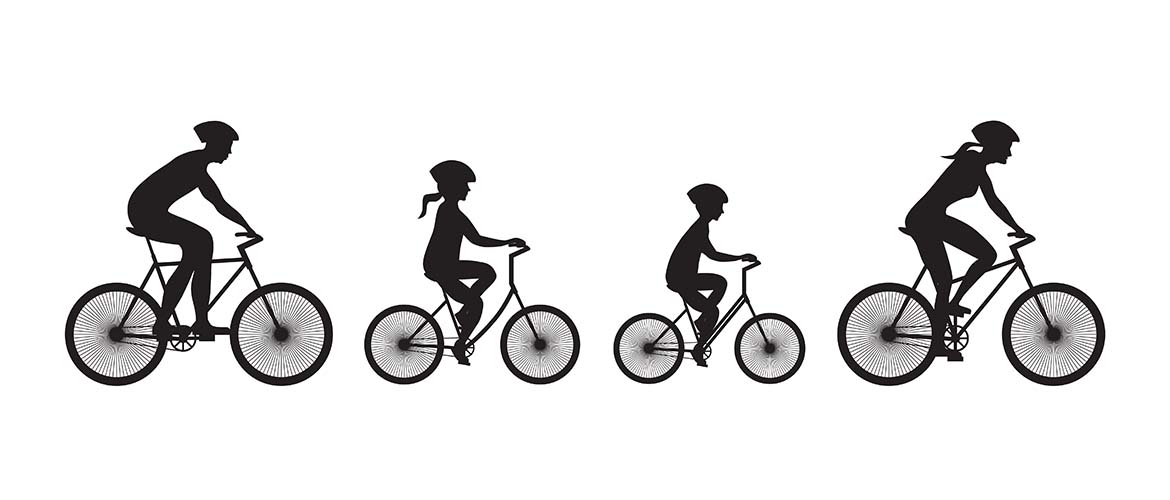 black and white silhouette of children riding their bikes with helmets on