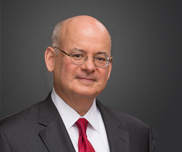 Professional headshot of Jose A. Suquet, Chairman of the Board, President and CEO Pan - American Life Insurance Group