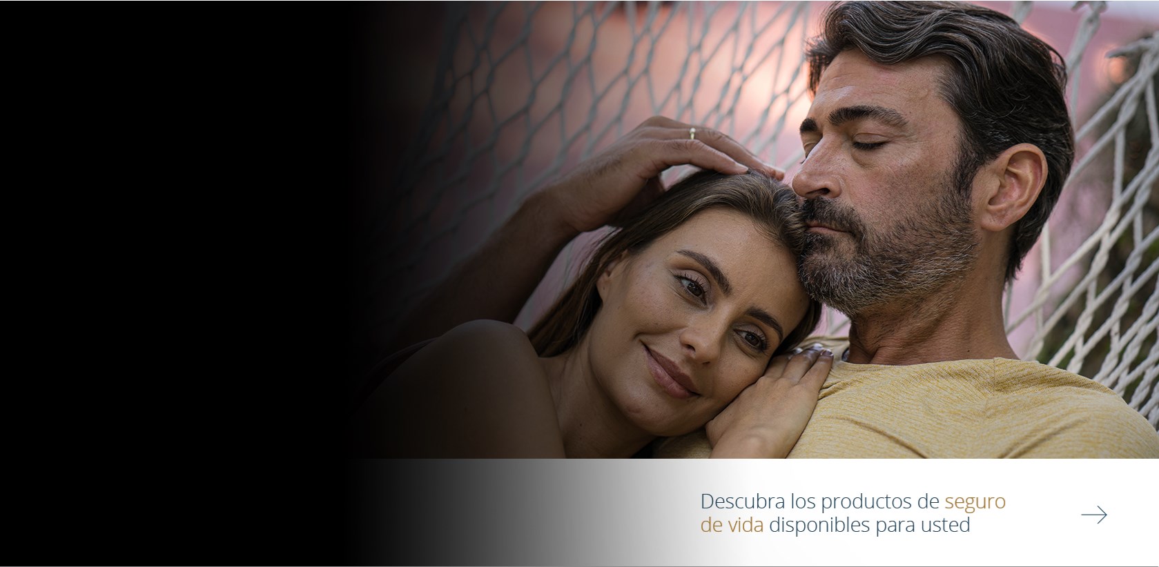 Married Latin American couple reading a magazine on life insurance coverage in Latin America by Pan-American Life Insurance Group
